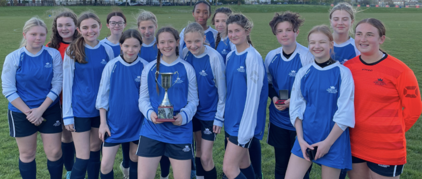 SCWA Year 8 and 9 Girls Football team with their trophy