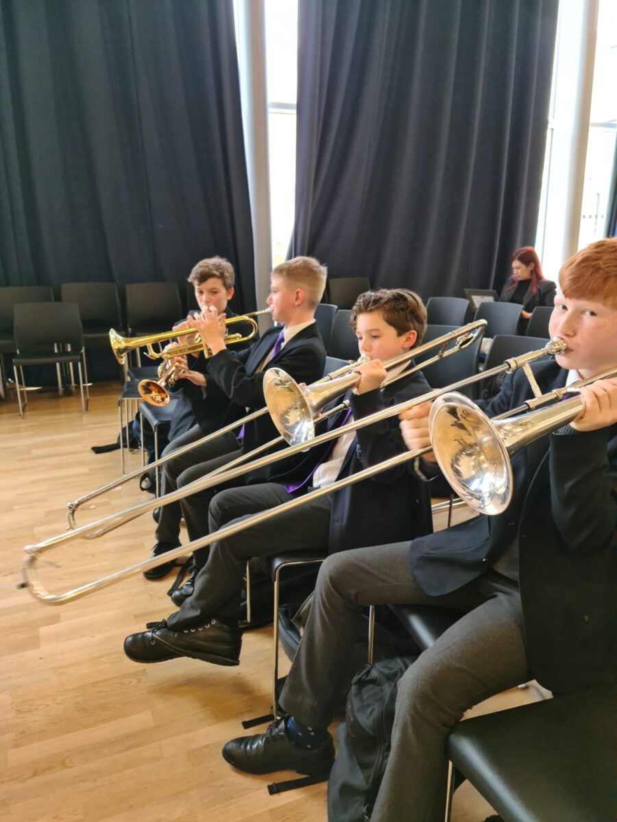 Students playing musical instruments