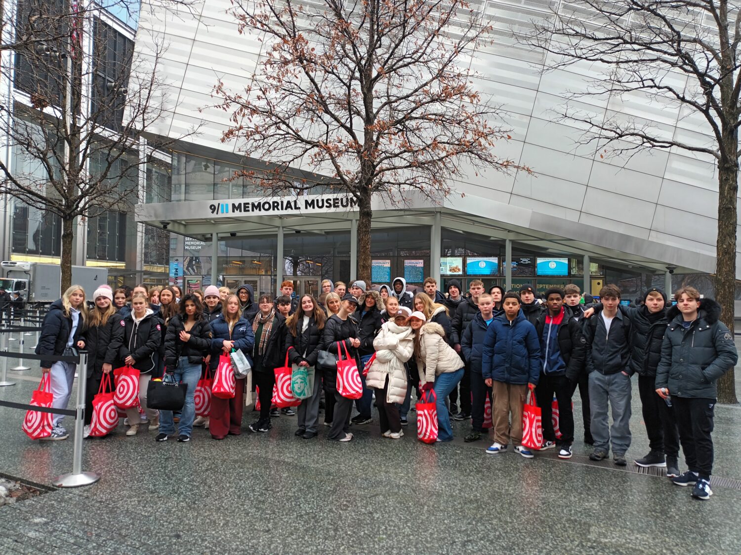 Group of all students stood outside the 9/11 Memorial Museum, New York City