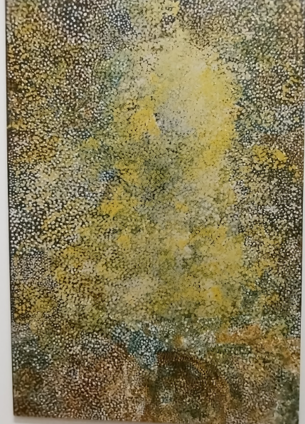 A vertical abstract painting created using a pointillist or dot technique. The dominant colors are a central vertical column of bright yellow and light green dots, surrounded by dark brown, black, and white dots. The composition suggests an illuminated figure or shape against a darker background, possibly representing a tree or glowing light.