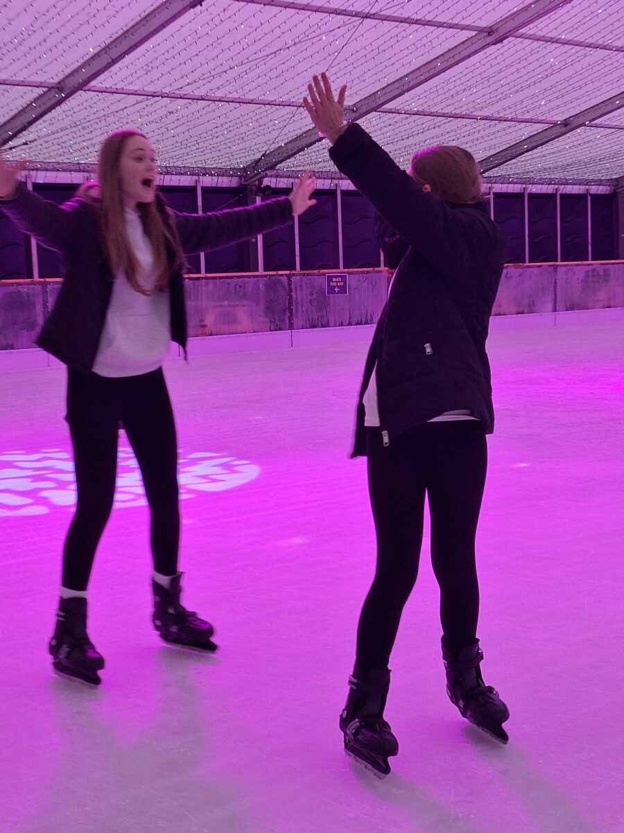 two girls on an ice rink